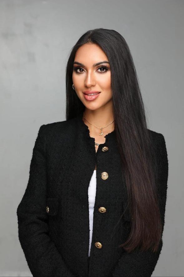 Amanda Gagliano in a black suit, angled portrait